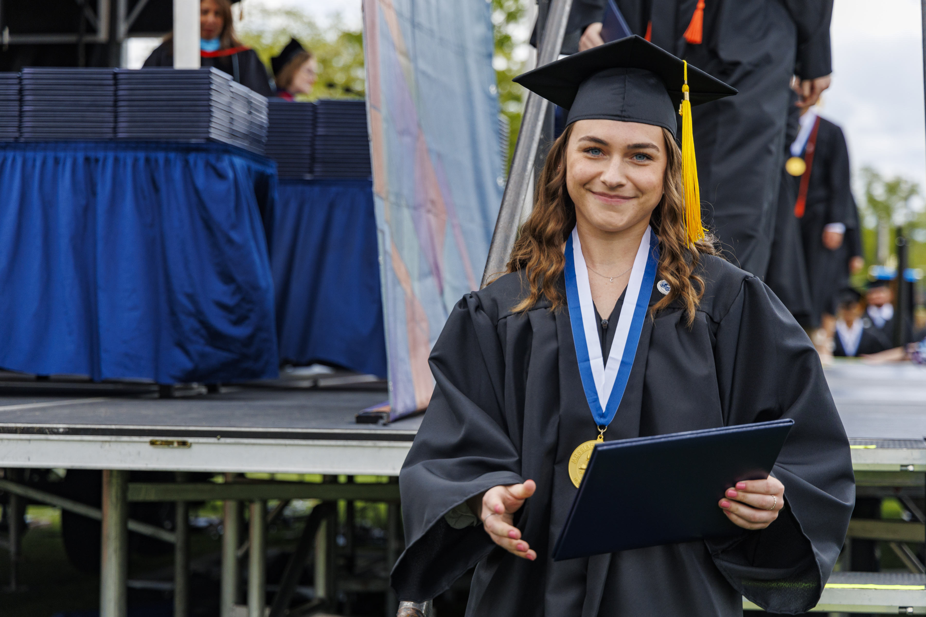 MUHP student with diploma