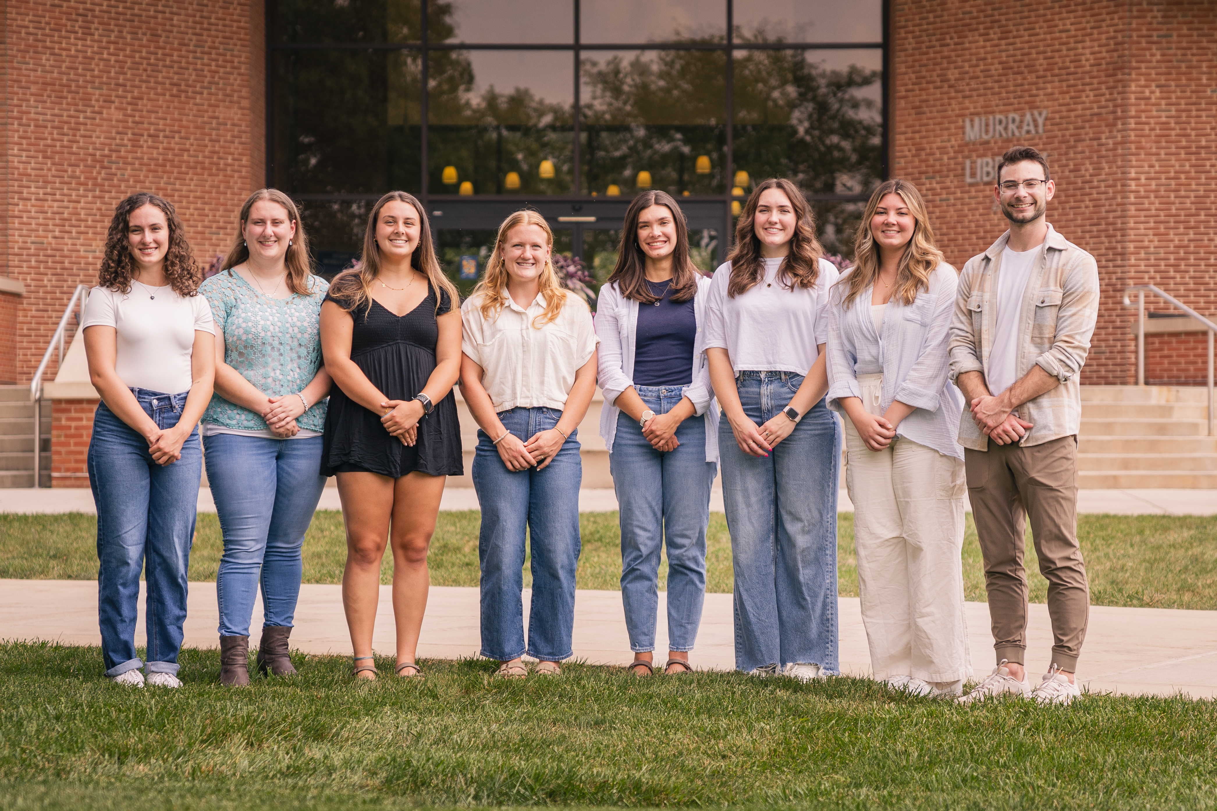 The Writing Center's tutors standing outside of Murray Library.