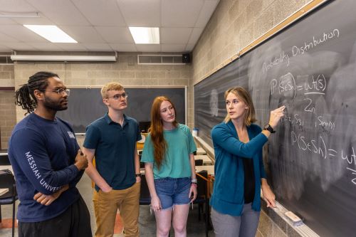 Students working in a classroom at Messiah 