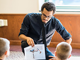 A teacher reading to students